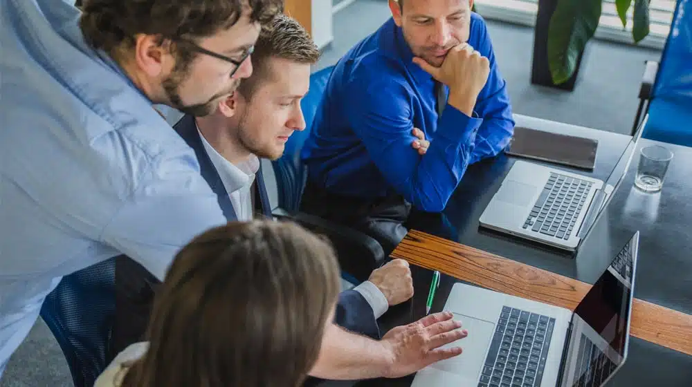 A Team Reviewing Results