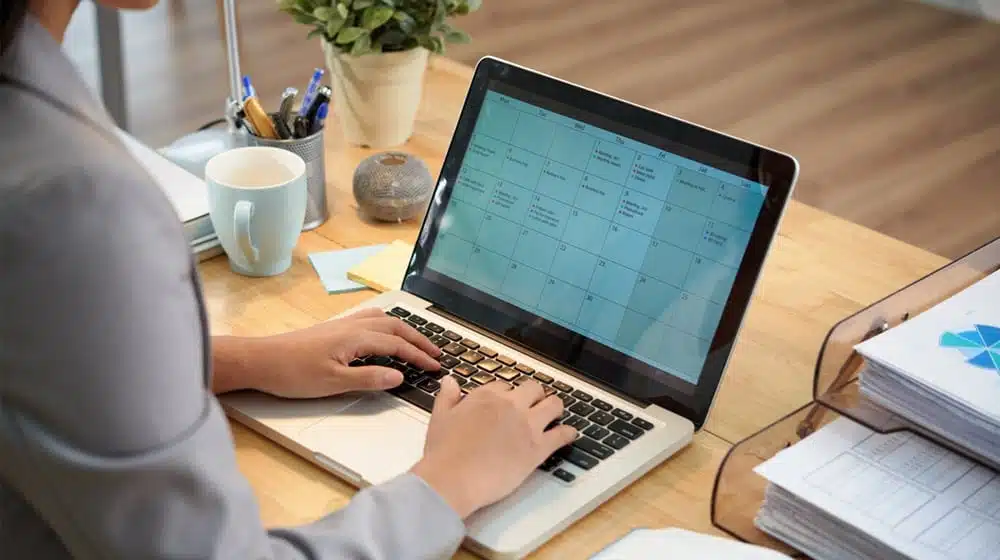 A Person Checking a Calendar