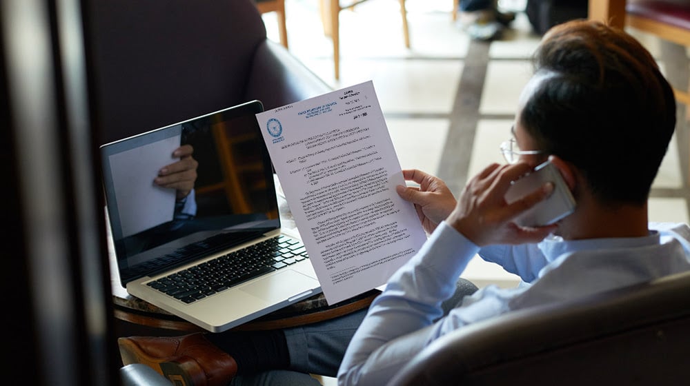 A Person Reading a Memo